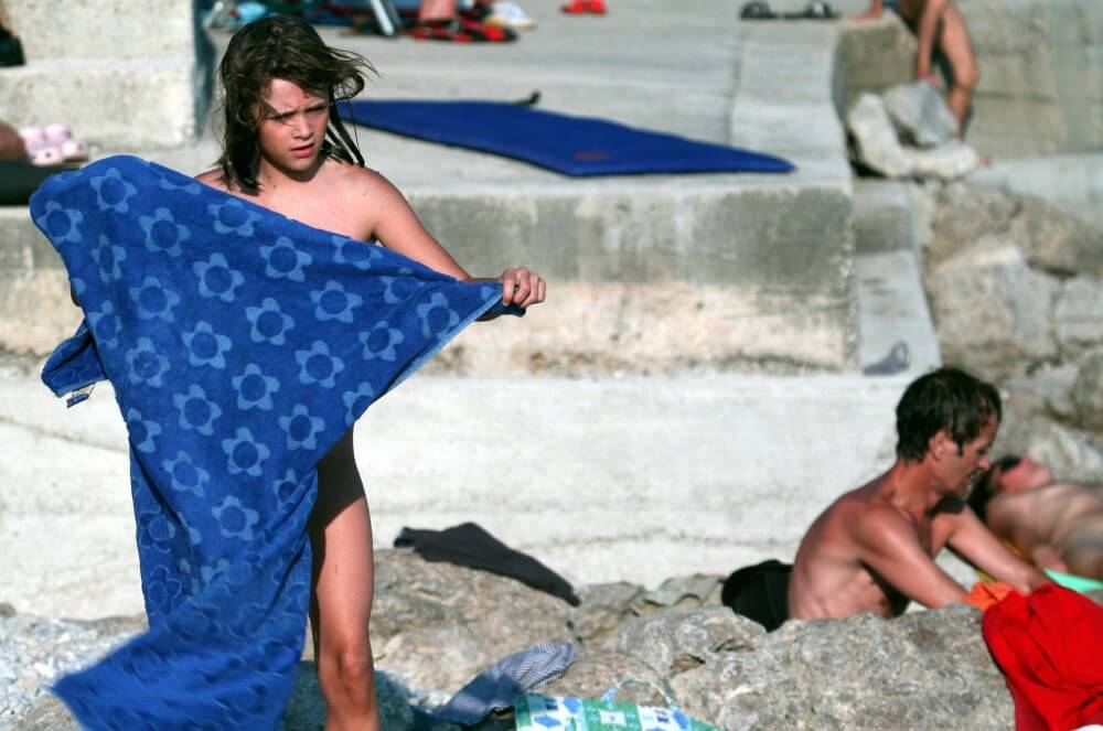 Nudist Rocky Family Angle - Nudism and naturism bring you closer to nature