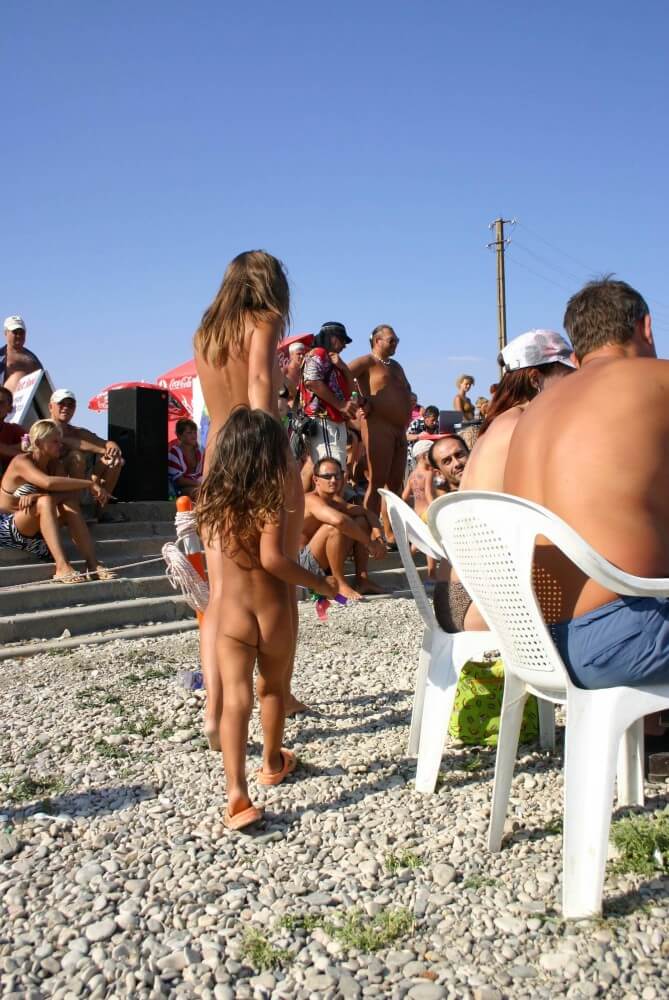 Naturist Standing Sideline - World Naturist Federation