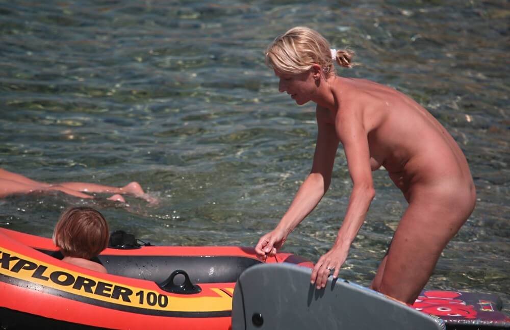 Red Boating for Two Nudists pics - Getting rid of swimsuits