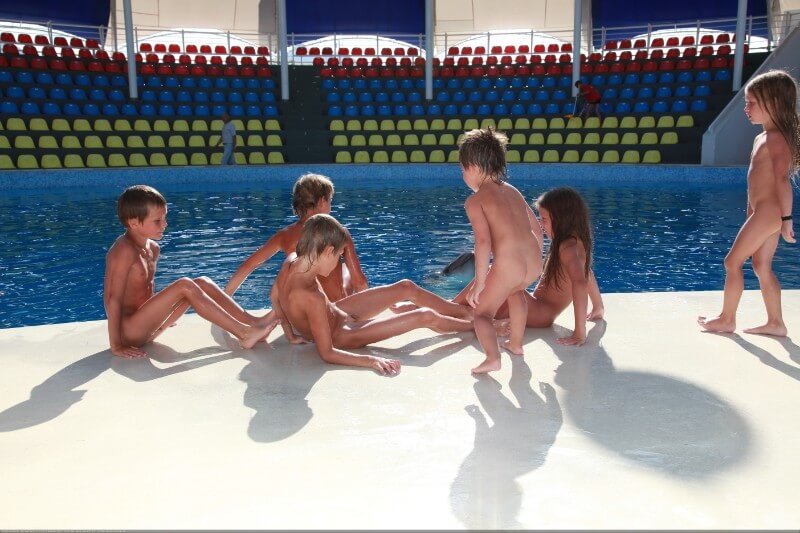 Swimming dolphins photo gallery - Peace and tranquility are important values for naturists