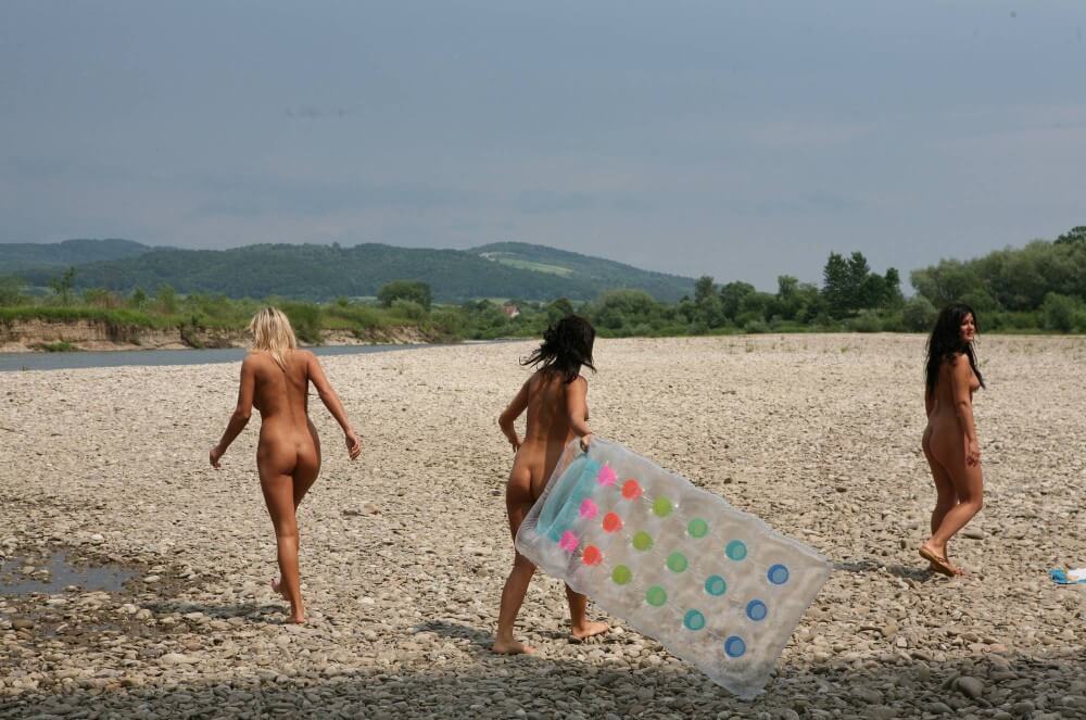 Naturist Park Floating On River photos - Advocates of naturism and nudism live in harmony with nature
