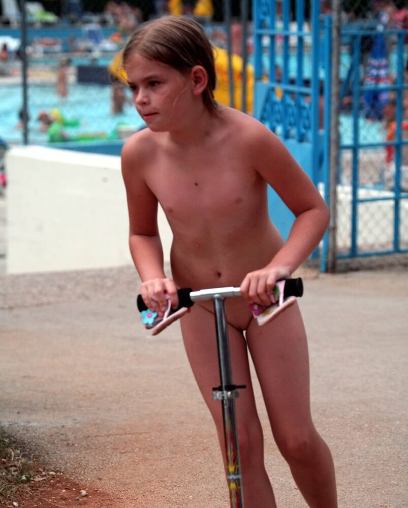 Pool-Side Naturist Scooter pics - Naturists love openness and freedom