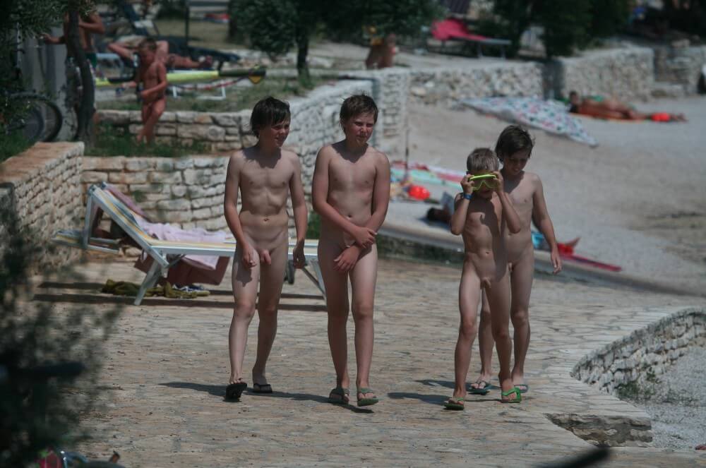 Shore walking nude - Naturism and nudism value openness and sincerity