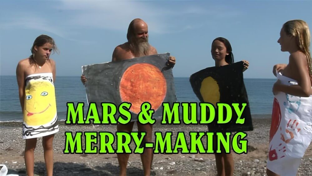 Enature - Mars and Muddy Merry-Making - Seeks harmony with the rhythms of nature and the environment through nudity