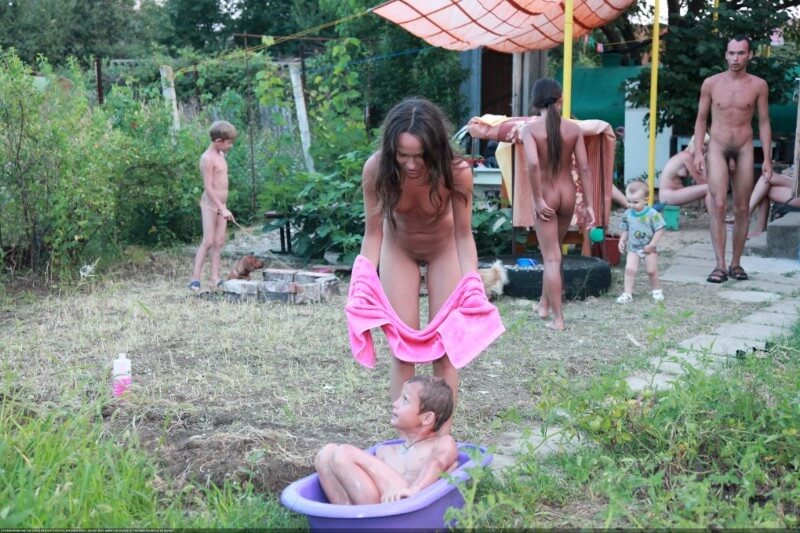 Green barrel of fun-grassy fields of gold photos - The practice of nudity within a community
