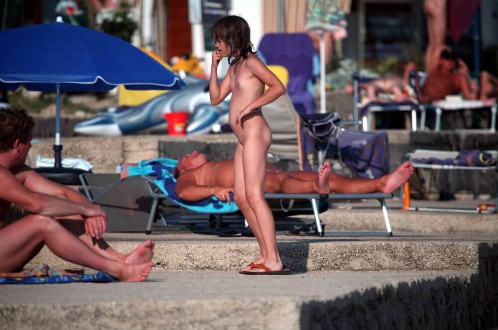 Girl Walk to Nudist Shower pics - Nudity as a natural aspect of human life