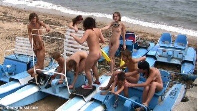 A group of naturists at sea - Nature is the best home for those who practice naturism and nudism