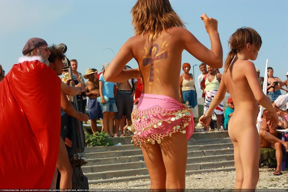 Colorful Carnival Dancing photos - Nudism and naturism bring you closer to nature